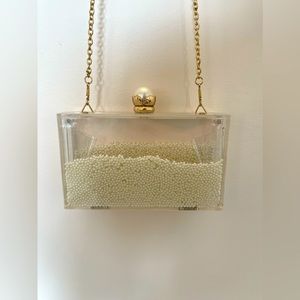 Call it Spring Clutch with Floating Pearls